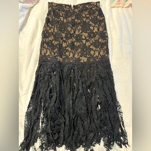 Alexis Black Lace on Tan Fabric Garment